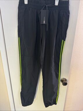Fashion Nova Black Joggers with Neon Green Side Stripes